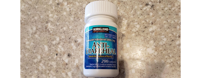 Anti-diarrheal pills laying on a countertop