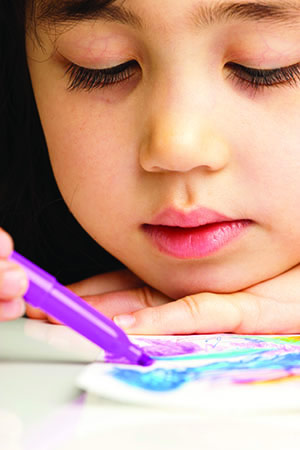 image of little girl coloring