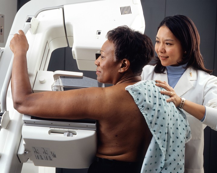 Black woman getting a mammogram