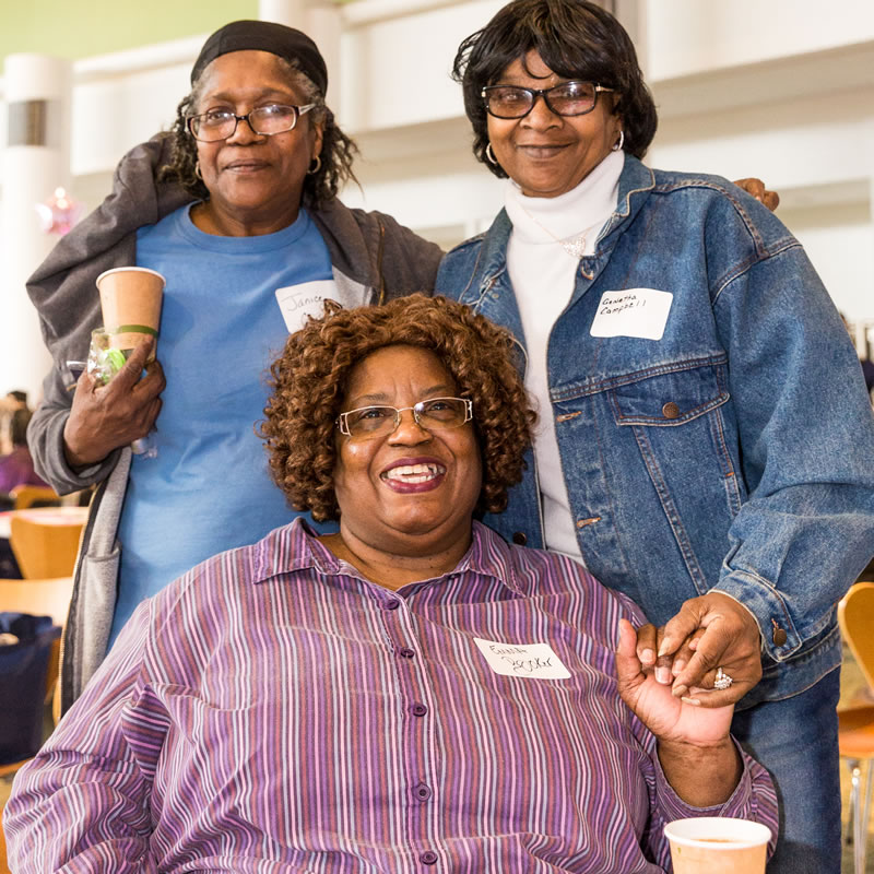 three friends attend the Breast Cancer Summit