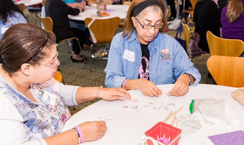 playing a game at the Breast Cancer Summit