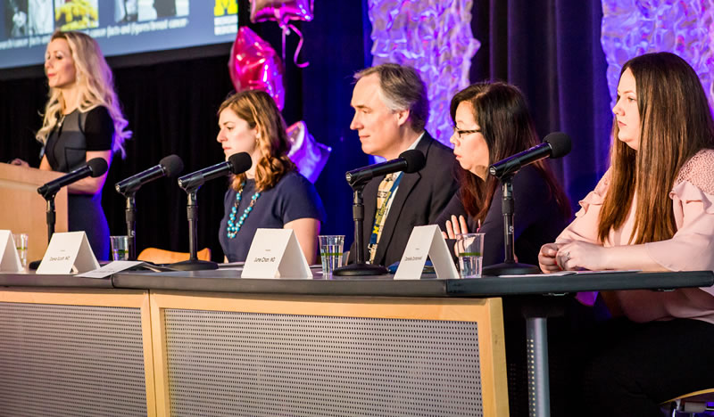 the panel of speakers at the Breast Cancer Summit