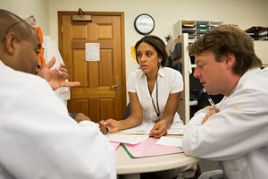 Members of the Genetics Clinic Team review test results