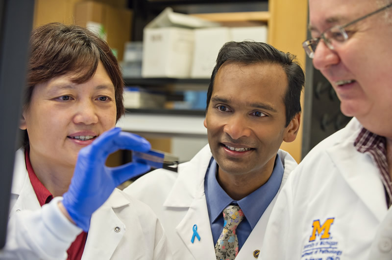 Arul Chinnaiyan, M.D., Ph.D. with members of his lab