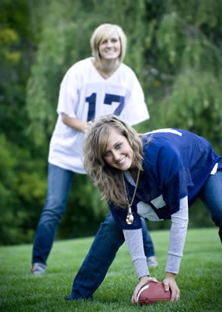 women playing football