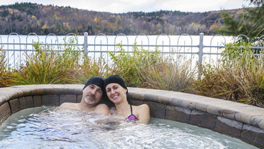 man and woman in a hot tub