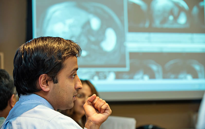 Neehar Parikh, MD at a Tumor Board Meeting
