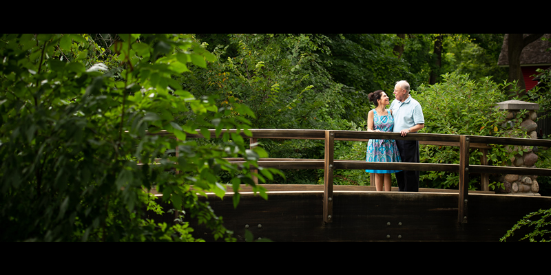 Harry Robins and his wife, Robyn Palmer standing on a bridge