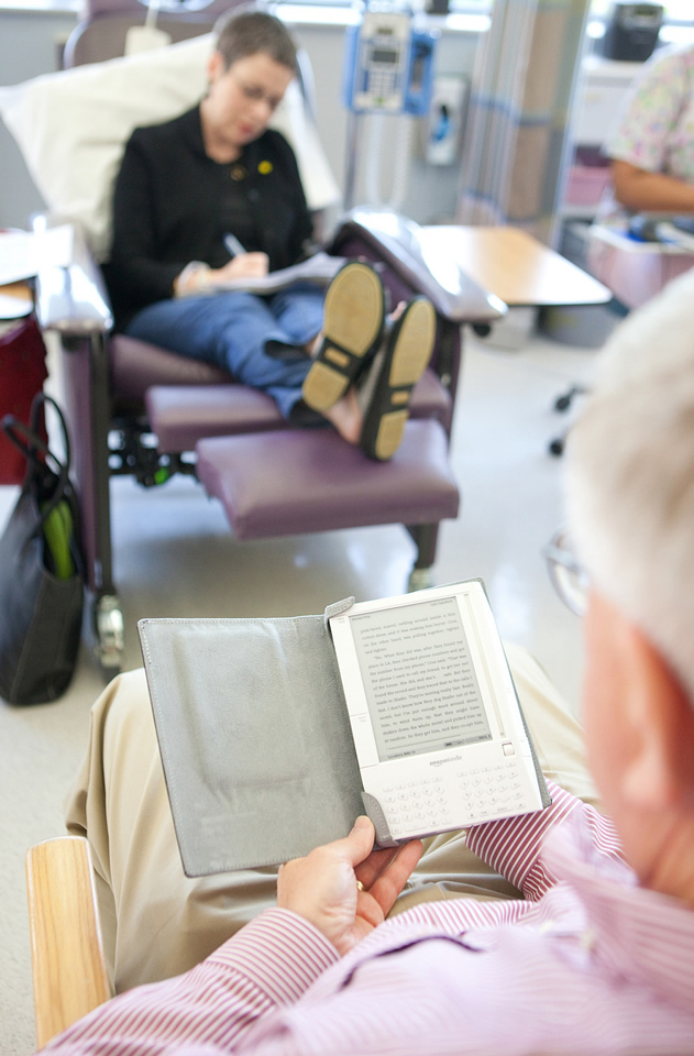 image of man using an electronic reading device