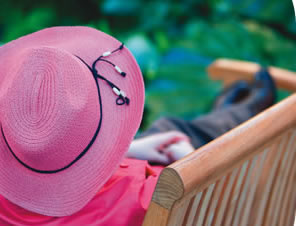 image of woman sitting in the sun