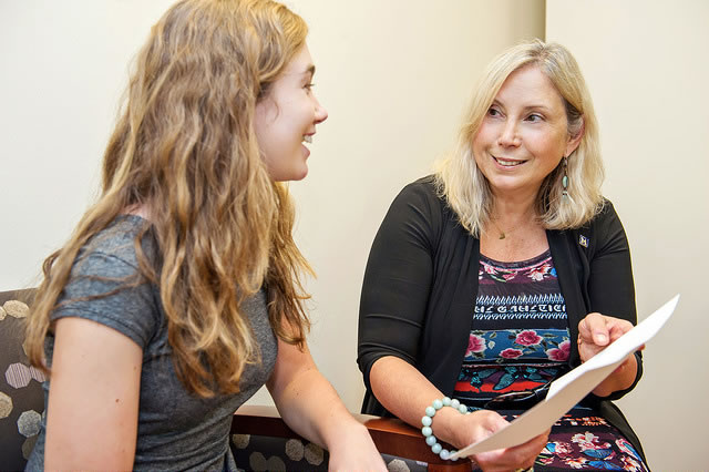 Sofia Merajver, MD with a patient