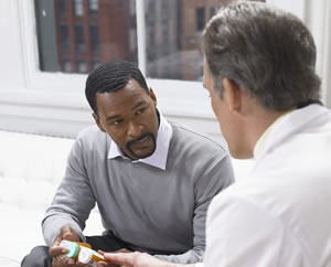 Doctor consulting with patient