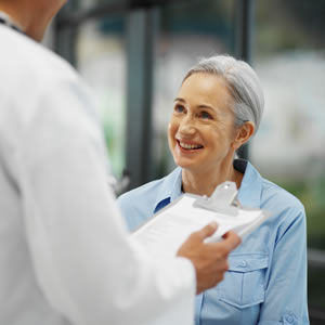 image of woman with her doctor