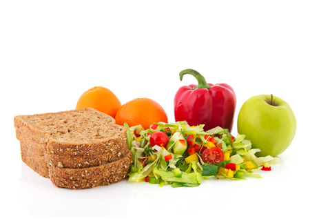 photo of bread, apple, salad, pepper and oranges