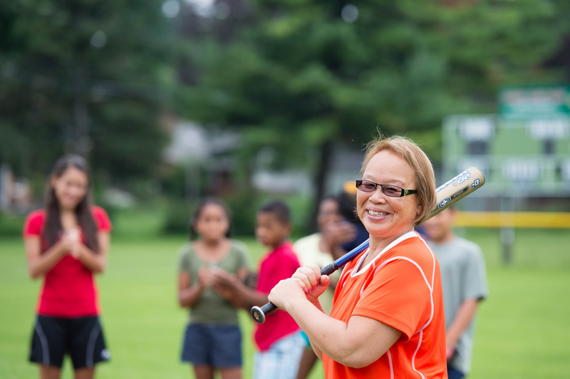 Woman playing baseball