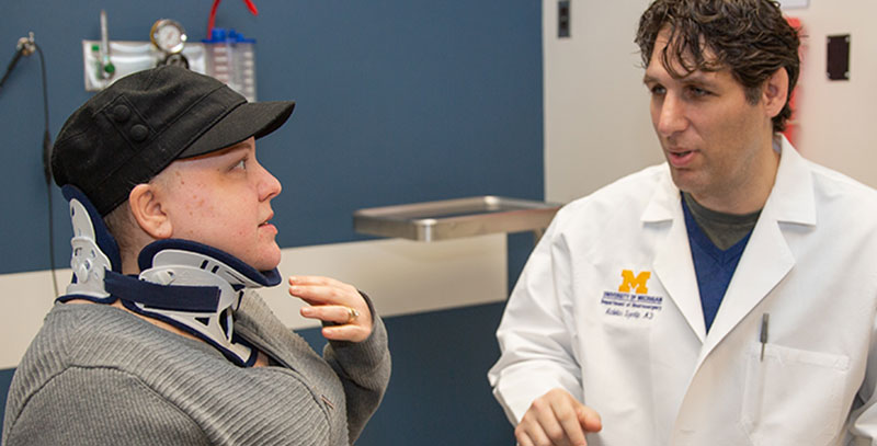 Nicholas Szerlip, M.D. with a female patient