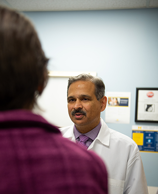 physician talking to a patient