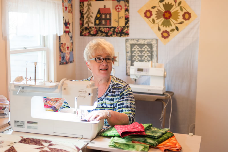Christine Knight at her sewing machine