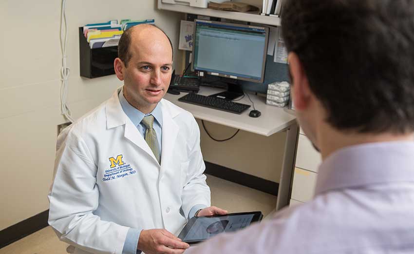 A doctor talking to a patient