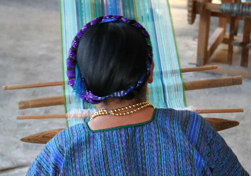 picture of woman in a purple blouse