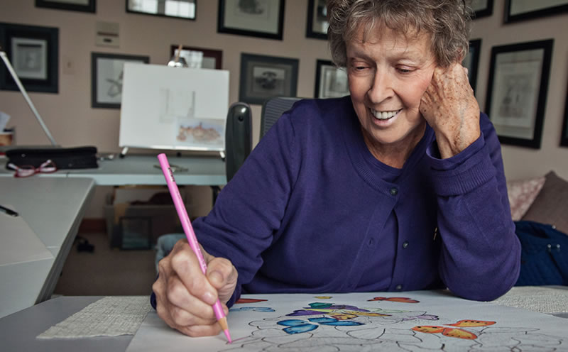 Rose Mary Worthen creating her artwork