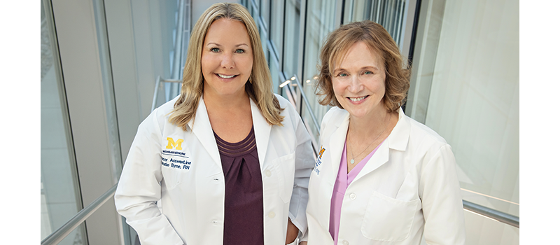 Two nurses standing side by side