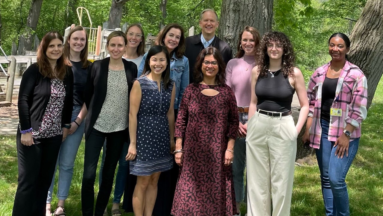 researchers stand in a group