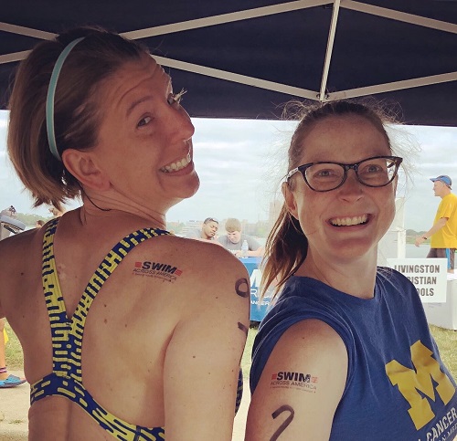 Kristin Van Raaphorst and Erin Christensen at the 2019 Swim Across America