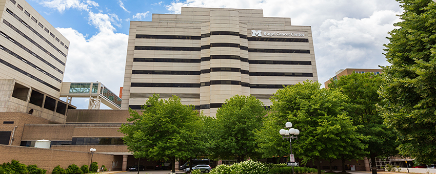 the Rogel Cancer Center building in the summer