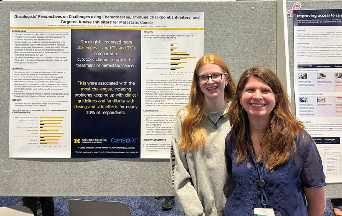 Christine Veenstra, M.D., and daughter Emma at her poster at ASCO 2025