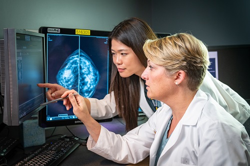 Radiologists look at a mammogram