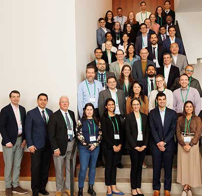 Dr. Angel Qin stands with colleagues at the 2023 LUNGevity Fall Science Meeting