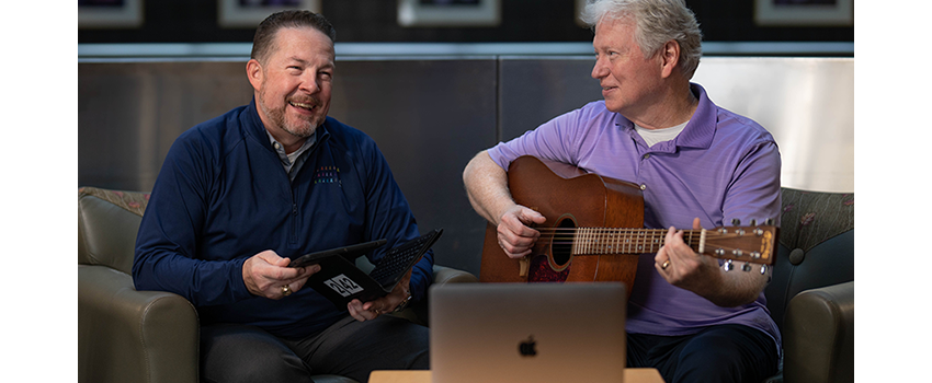 Bruce Paul and Bob Huffman record a music therapy video