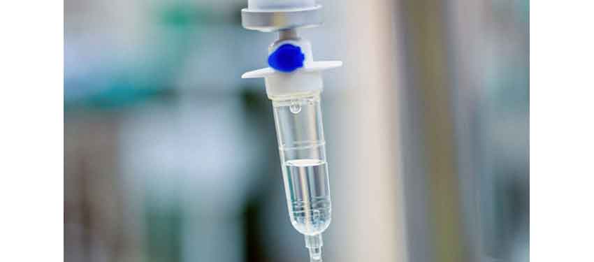 close-up of IV drip with medication