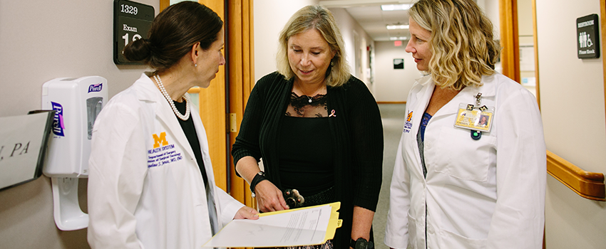 Jacqueline Jeruss, M.D., Ph.D., Sofia Merajver, MD, PhD and colleague