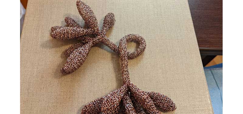 rustic brown fiber creates a starfish-like sculpture