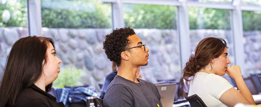 Pathways students listen to a lecture