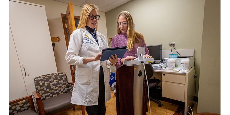 Dr. Melissa Pilewski works with a patient