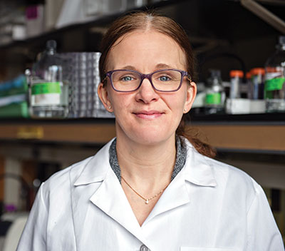 Meredith Morgan, Ph.D. is a middle-aged white woman wearing glasses