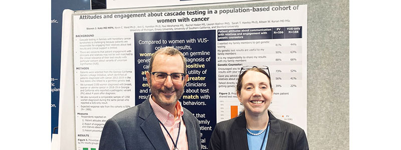 Steven Katz, M.D., M.P.H. and Allison Kurian, M.D., M.Sc. stand in front of their poster