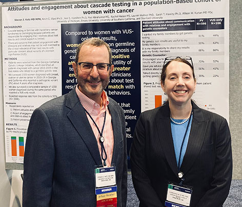 Dr. Steven Katz stands with Dr. Allison Kurian in front of his poster board at ASCO