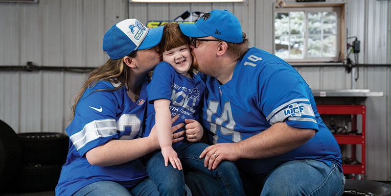 Zach Hiser with his wife and daughter