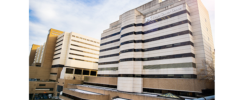 View of the Rogel Cancer Center building with University Hospital to the left